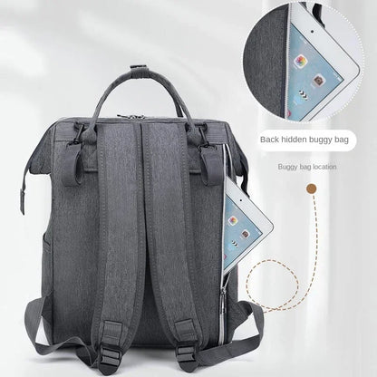 Dos du sac à langer avec poche cachée et sangle de poussette