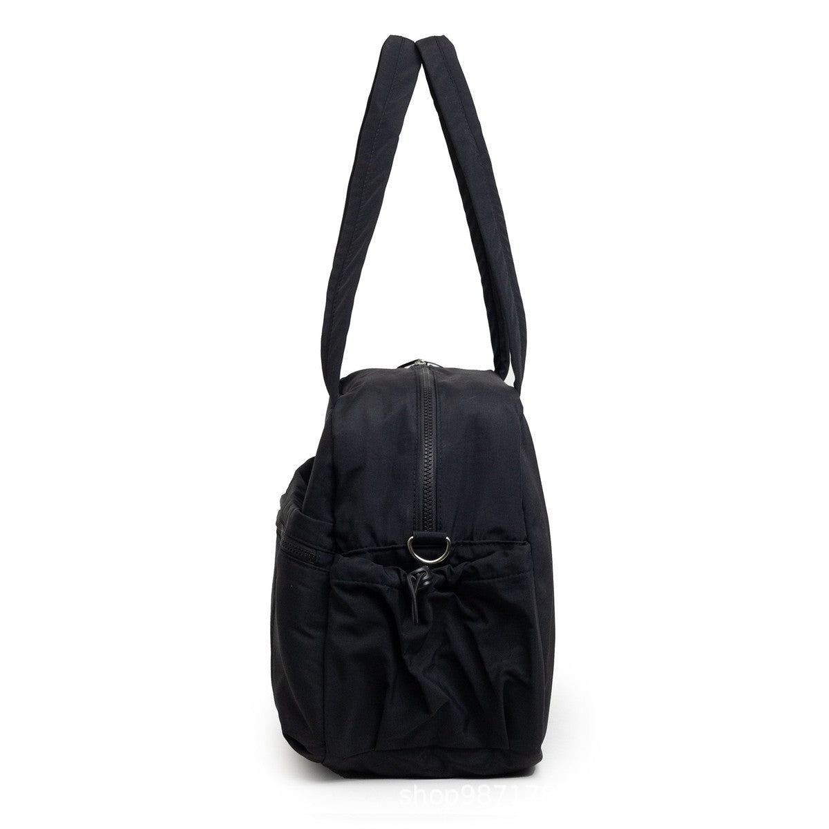 Sac à langer week-end noir vu de profil, poche latérale élastiquée